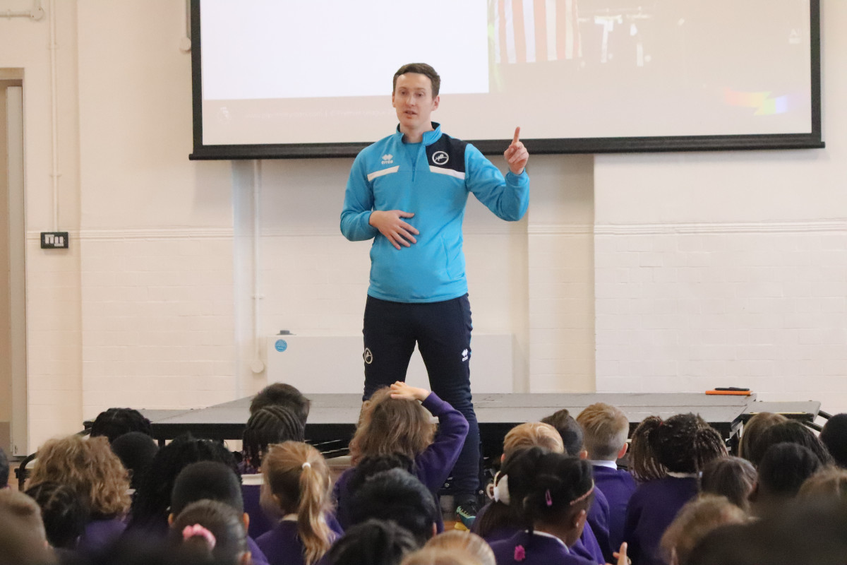 Millwall Pride Manager Andy Dolan delivers Premier League Primary Stars Rainbow Laces Campaign Assembly